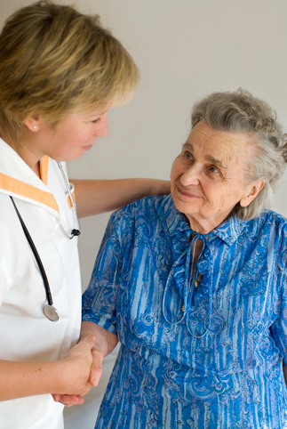 Professional Physical Therapist helping an elderly woman